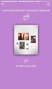 Screencap showing an image of a panel of artworks against a purple background. Over the image are the words 'You've submitted the most popular response!' and an applause icon. Below the image are the words 'At least a hug a day' and a smaller applause icon.
